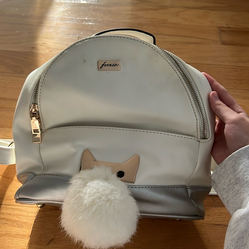 Mini backpack with little dog design and Pom Pom charm